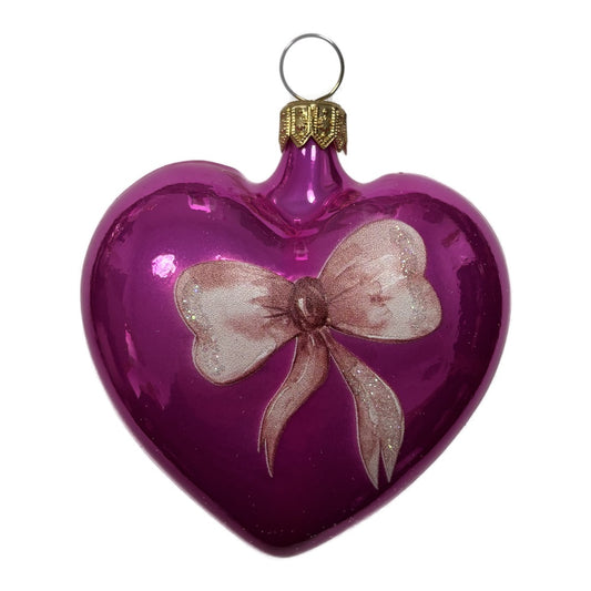Premium Magentafarbenes Glasherz mit rosa Schleife